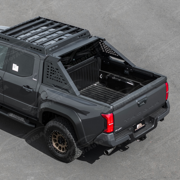 Adjustable steel chase rack on a white Toyota Tacoma
