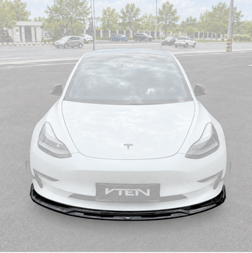 SuperAutoUSA VTEN style 1-piece gloss black front bumper lip splitter installed on a 2017-2023 Tesla Model 3
