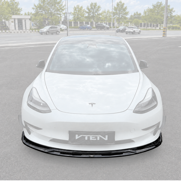 SuperAutoUSA VTEN style 1-piece gloss black front bumper lip splitter installed on a 2017-2023 Tesla Model 3