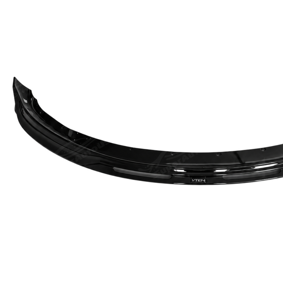 Reflective UV-resistant high-gloss top coat on the SuperAutoUSA VTEN front splitter under outdoor sunlight
