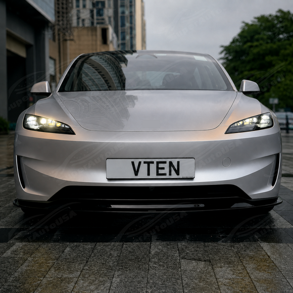 High-gloss black SuperAutoUSA VTEN 3-piece front lip creating a sharp contrast on a Pearl White Multi-Coat Tesla Model 3