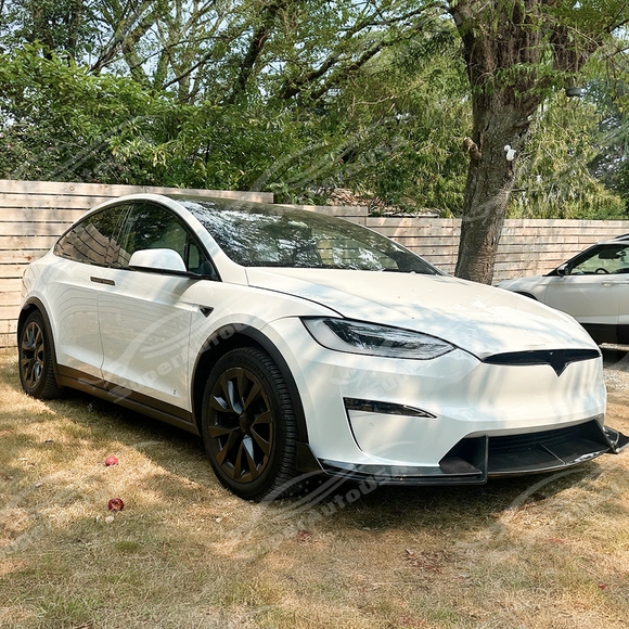 SuperAutoUSA real carbon fiber front splitter on a white Tesla Model X