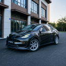 Close-up view showing precision 3D edge-to-edge alignment along the factory Tesla Model Y lower bumper