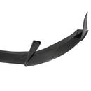 Front-end shot emphasizing the widened, muscular stance of the GR86 with carbon aero