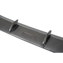 Detailed shot of the UV-resistant high-gloss clear coat on the Toyota GR86 carbon lip