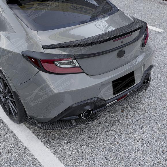 Aggressive carbon print GT-style rear diffuser kit installed on a 2023 Subaru BRZ.