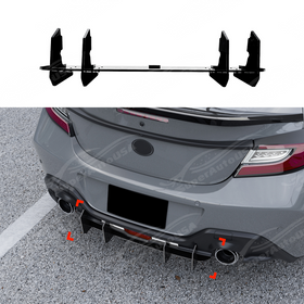 Gloss black V-style rear bumper shark fin diffusers installed on a 2022 Toyota GR86.