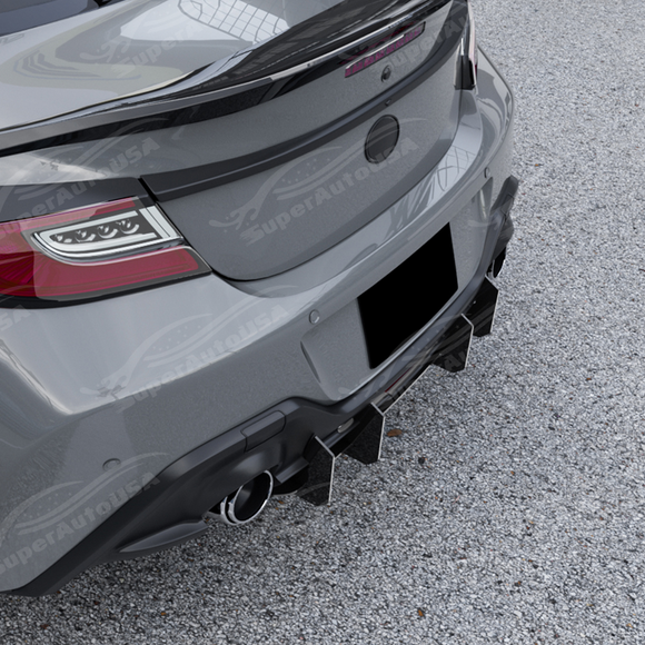 Showing the ample clearance around the factory quad-tip exhaust with the gloss black diffuser installed.