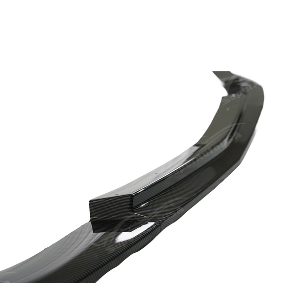 Underside view of the front lip splitter showing mounting holes for C6