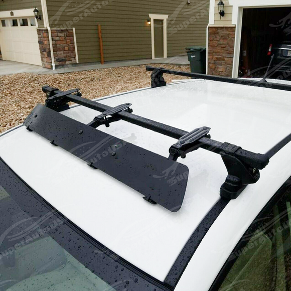 Full front view of a car with a 43-inch rooftop wind fairing and crossbars