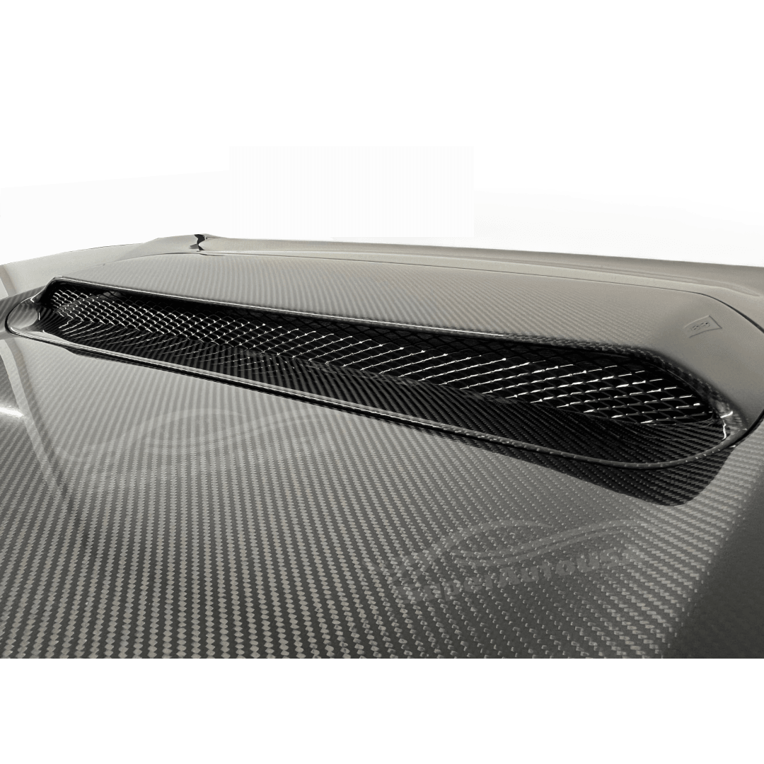 Artistic view of the Subaru WRX featuring the Double Side Real Carbon Fiber Front Engine Hood, showcasing the high-quality texture and reflective sheen