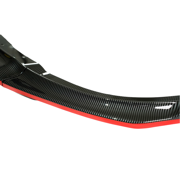 Centered product-only shot of the SuperAutoUSA STI carbon print front splitter with red trim