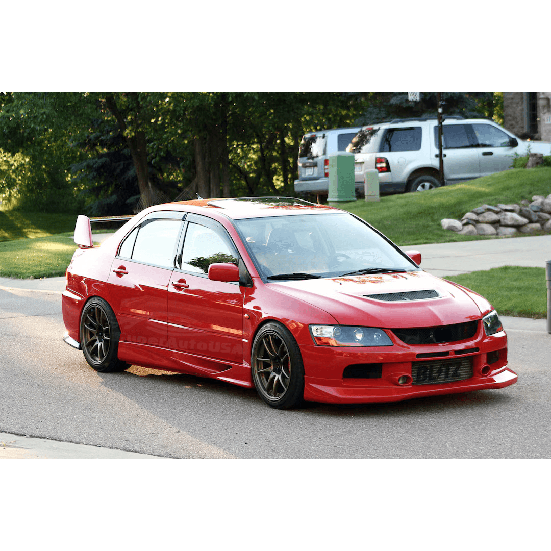 Dynamic side view of 2001 2002 2003 2004 2005 2006 2007 Mitsubishi Lancer Evolution EVO 7 8 9  adorned with PU black side skirts from the Side Body Skirts Kit, emphasizing its sleek, aerodynamic design and enhancing overall vehicle aggression.