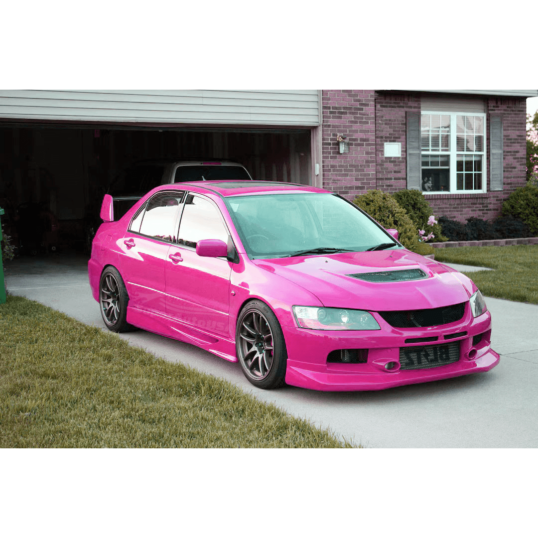 Gloss black side skirts fitted on a 2001 2002 2003 2004 2005 2006 2007 Mitsubishi Lancer Evolution EVO 7 8 9 , part of the comprehensive automobile exterior body kits, offering a bold visual upgrade.