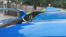 Video of Gloss black roof visor providing a sporty contrast on a World Rally Blue Subaru STI