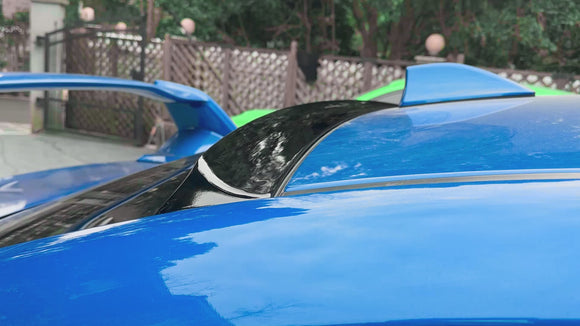 Video of Gloss black roof visor providing a sporty contrast on a World Rally Blue Subaru STI