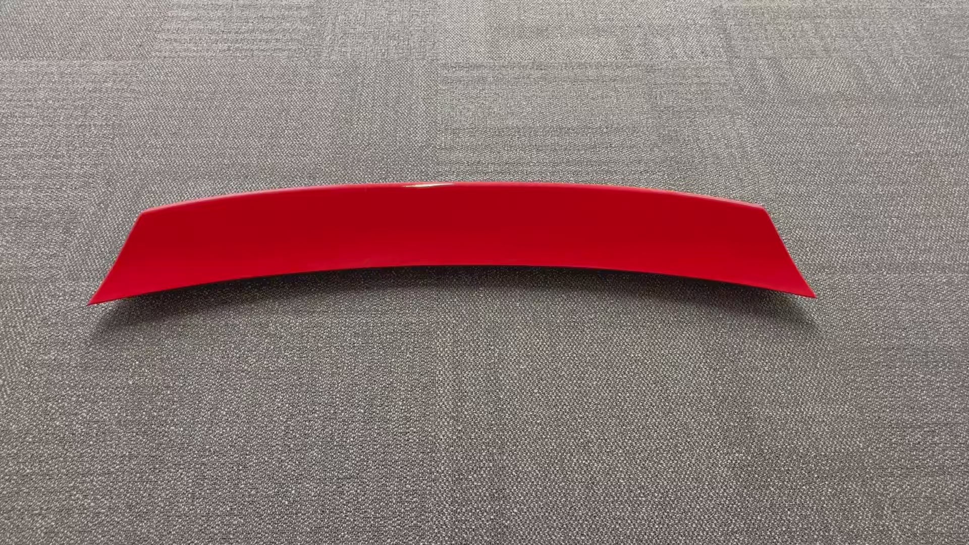 Close-up view of the Paint Matched Ignition Red Duckbill Trunk Spoiler on the WRX STI 2022-2024, highlighting its precision fit and vibrant color.