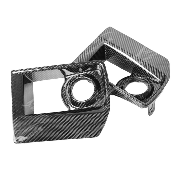 Rear view of uninstalled carbon fiber fog light bezels