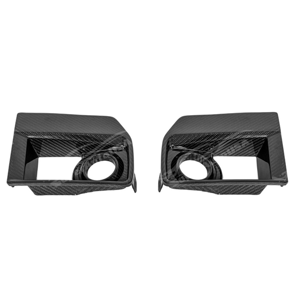 Sleek carbon fiber fog light bezel installed on a Cadillac CTS