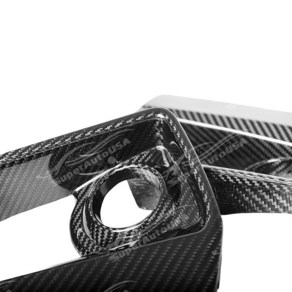 Cadillac CTS in motion with carbon fiber front bumper fog light bezels