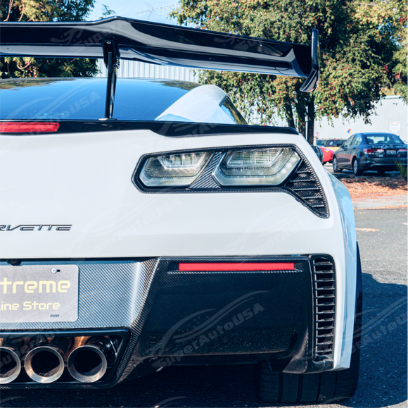 Uninstalled carbon fiber rear tail light bezels pair