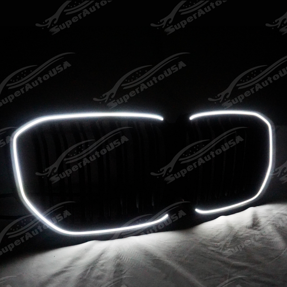 Gloss black LED grilles insert on a white BMW X5 G05