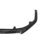 Toyota Camry in motion with front lip spoiler