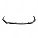 Front splitter lip on a white Toyota Camry