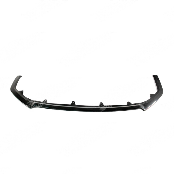 Front splitter lip on a white Toyota Camry