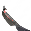 BMW G87 M2 in motion with carbon fiber front lip splitter