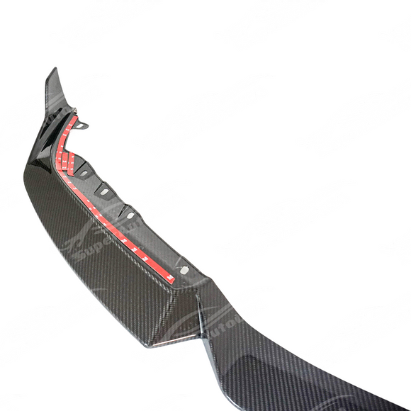 BMW G87 M2 in motion with carbon fiber front lip splitter