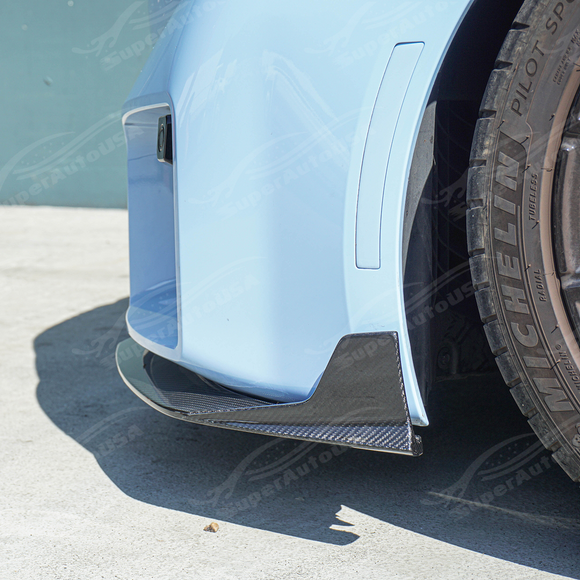 Underside view of carbon fiber front lip showing mounting points