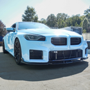 Sleek carbon fiber front splitter installed on BMW G87 M2