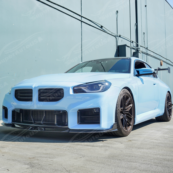 Low angle view emphasizing carbon fiber front lip on G87 M2