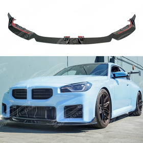 Carbon fiber front lip splitter spoiler on a 2023 BMW G87 M2